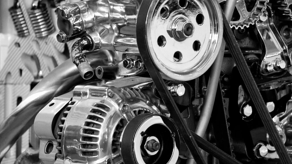 Greyscale Photography of Car Engine